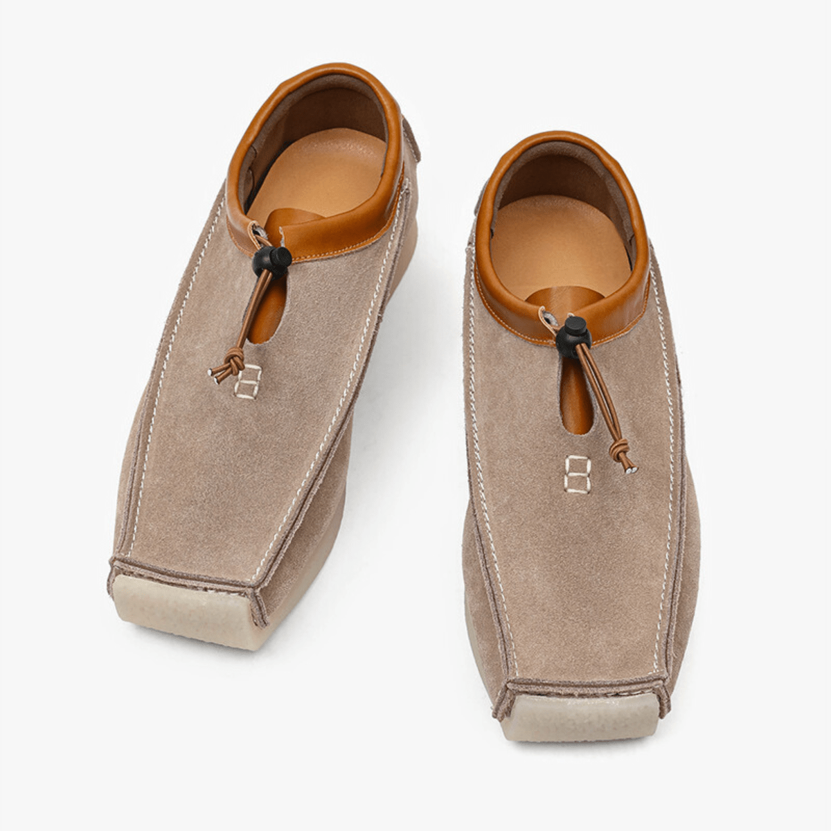 Leather and suede loafers with square toe and drawstring closure