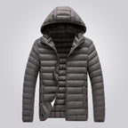 Women's hooded longline puffer jacket, quilted and padded for winter - Grey