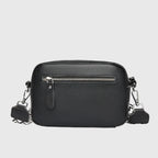 Women's leather crossbody bag with wide woven strap