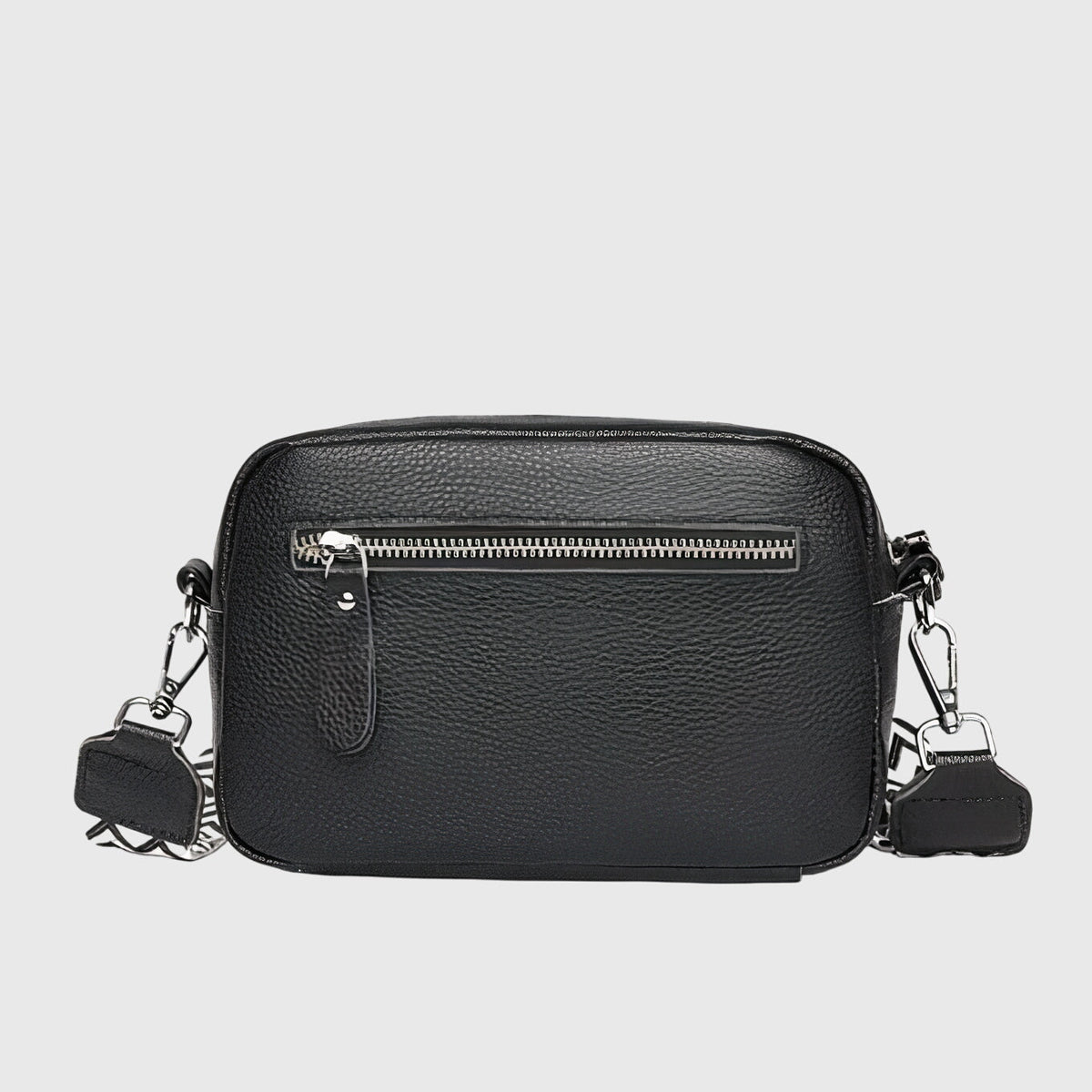 Women's leather crossbody bag with wide woven strap