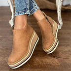 Women's platform ankle boots with chunky sole and side cutout