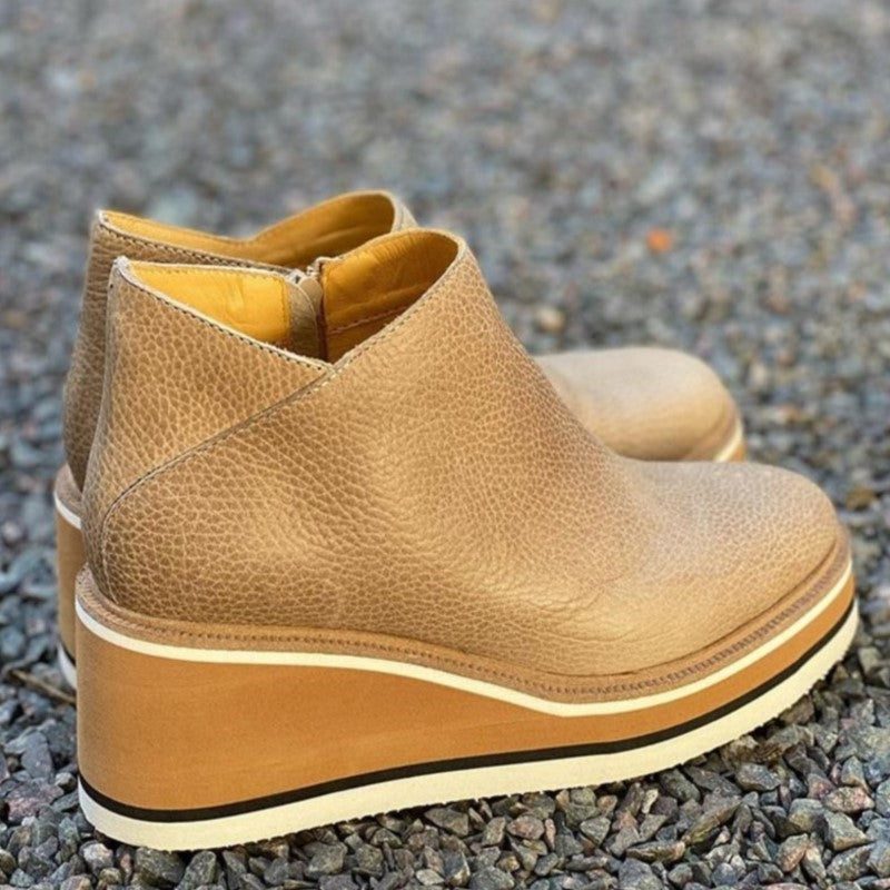 Women's platform ankle boots with chunky sole and side cutout
