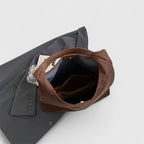 Women's minimalist shoulder bag with structured design