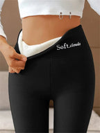 Women's winter trousers with fleece lining and stretch fabric - Black